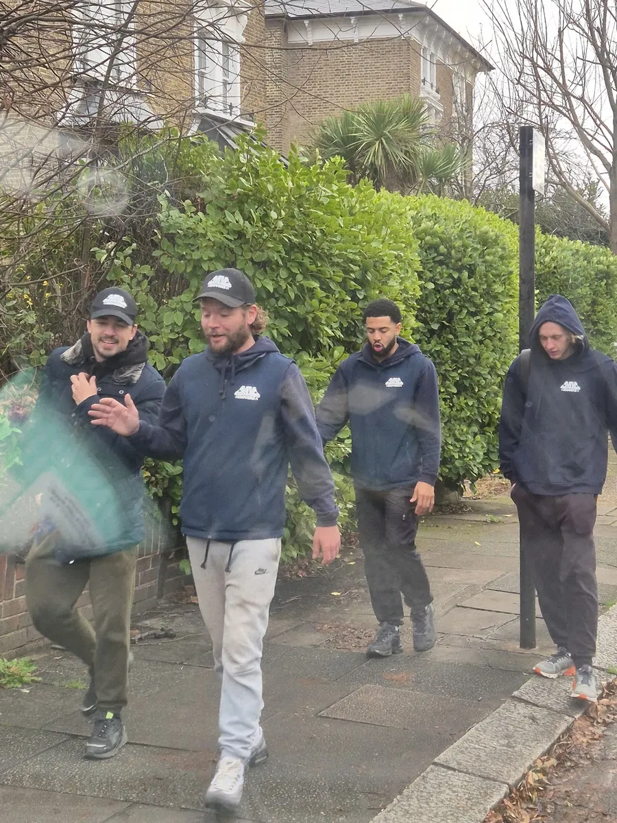 Walking in with the kit – Four up – MV Movers