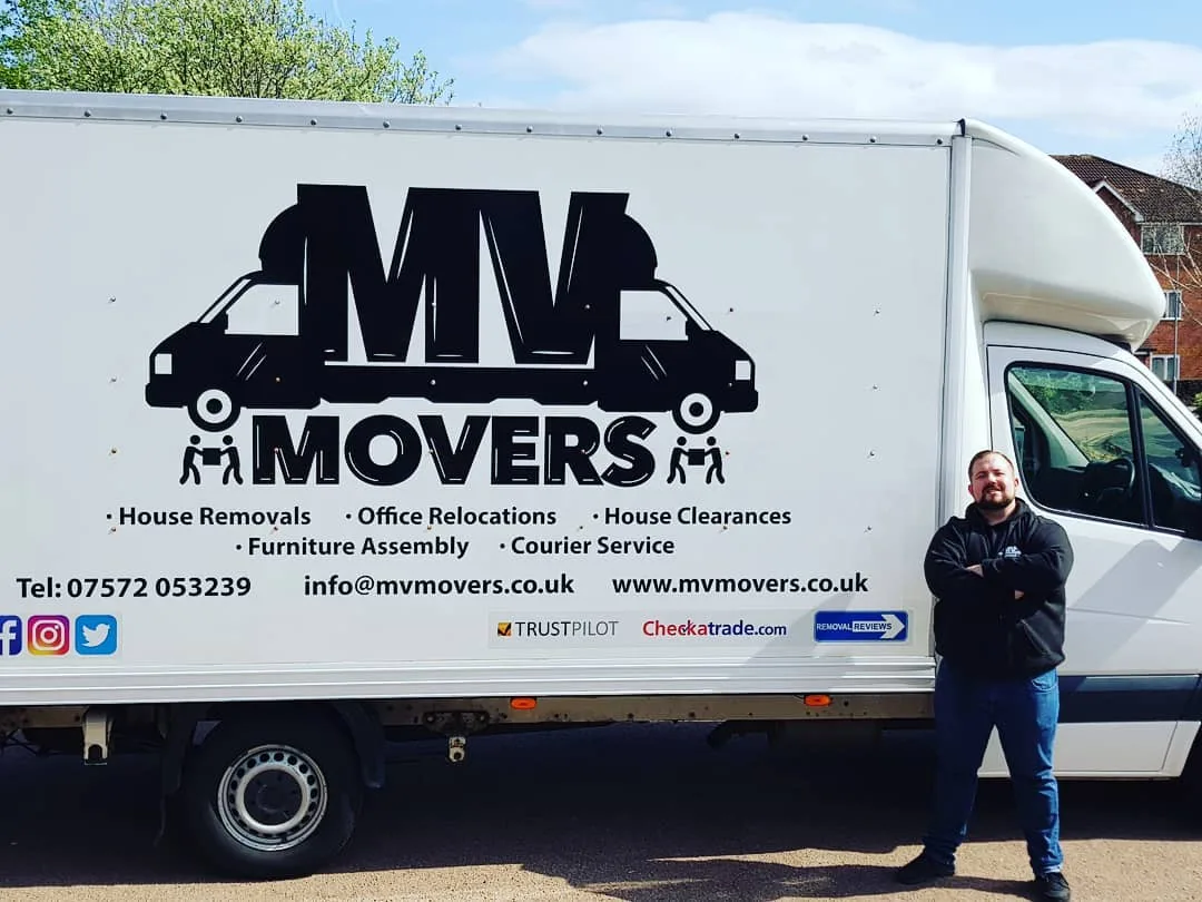 Dave, founder and owner of MV Movers, standing in front of one of his branded removal vans in Ealing Dave, founder and owner of MV Movers, standing in front of one of his branded removal vans in Ealing