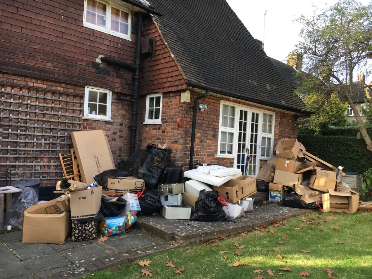 Items stacked outside a house ready for clearance – House & Office Clearance by Dave's MV Movers crew Items stacked outside a house ready for clearance – House & Office Clearance by Dave's MV Movers crew