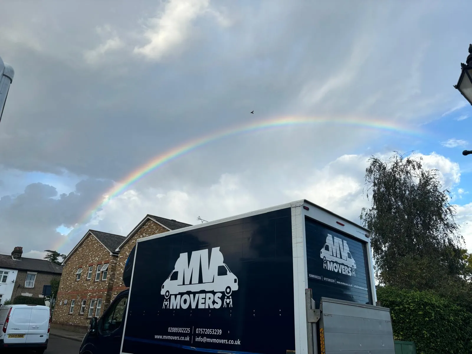 Rainbow – Van under a West London rainbow – MV Movers
