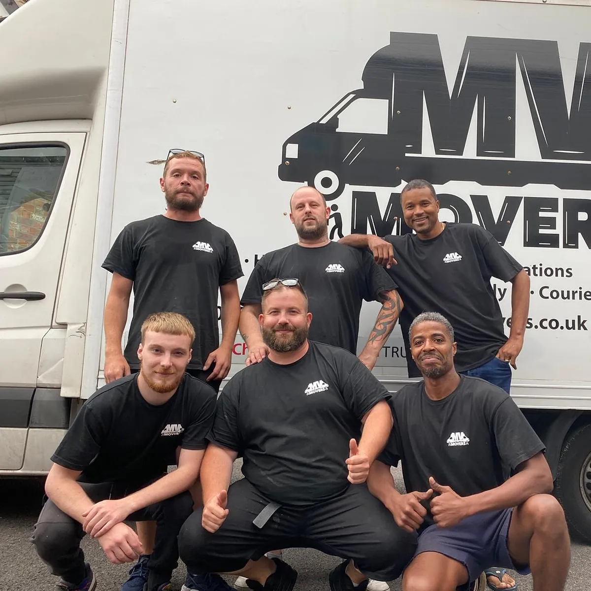 Seven of the squad – One van, one team photo – MV Movers