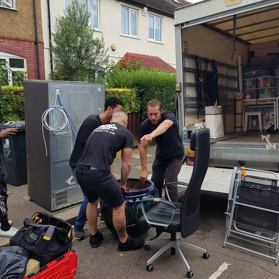 MV Movers crew loading office chairs and a fridge onto the van – Office Relocations by Dave's MV Movers crew MV Movers crew loading office chairs and a fridge onto the van – Office Relocations by Dave's MV Movers crew