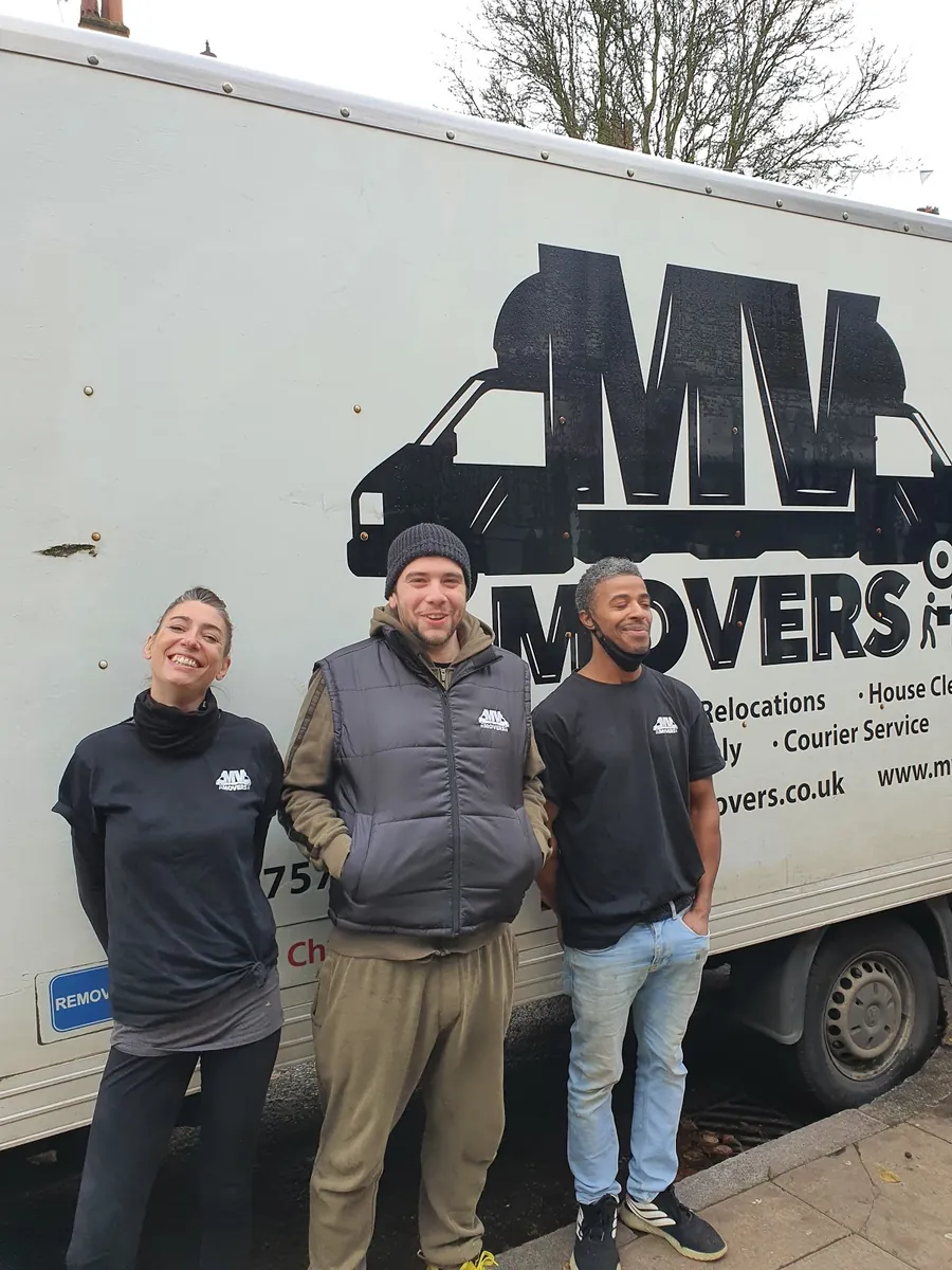 By the van – Three of the regular crew – MV Movers